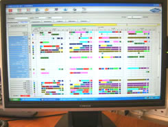 Photograph of computer displaying screenshot of Seki Scheduler